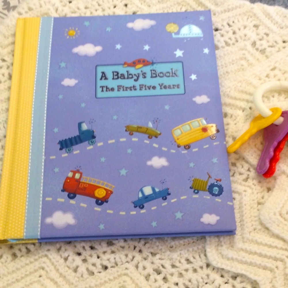 A Baby’s Book. The First Five Years. With hand crocheted receiving blanket.